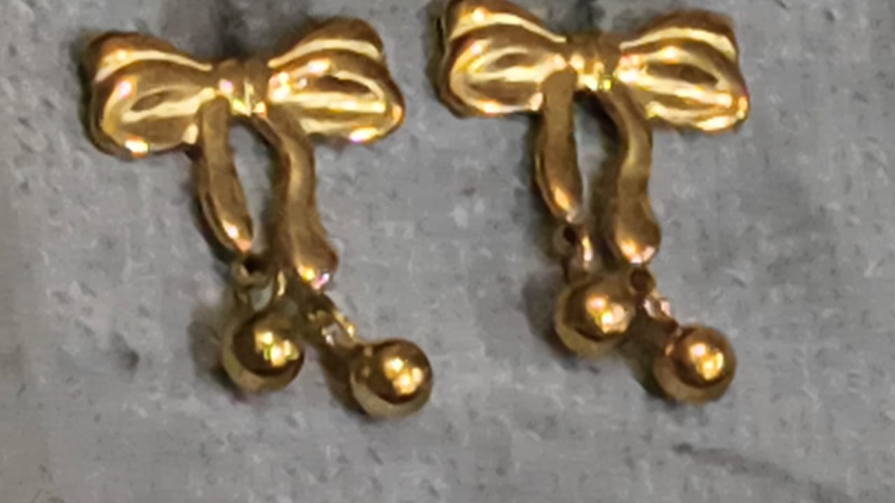 Golden bow charm earrings